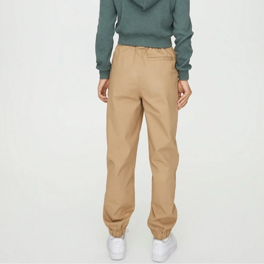 TNA Tan Track Pants for Women

#1244 - Picture 2 of 12